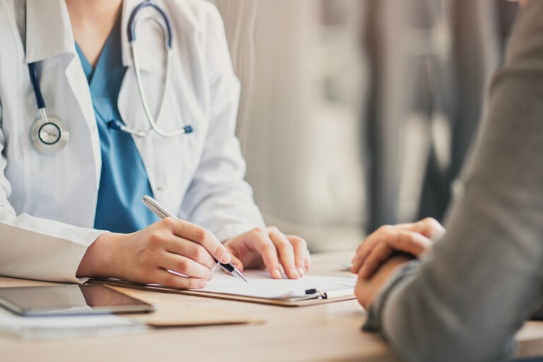 Medical appointment with doctor and patient